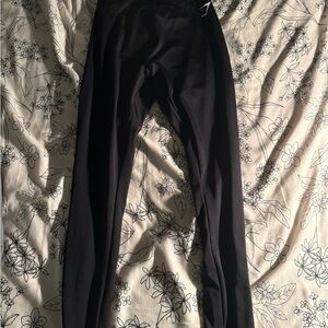Gymshark Butt Scrunch Black Leggings with Logo Detail on waist.